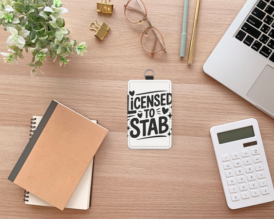 licensed to stab vertical id holder